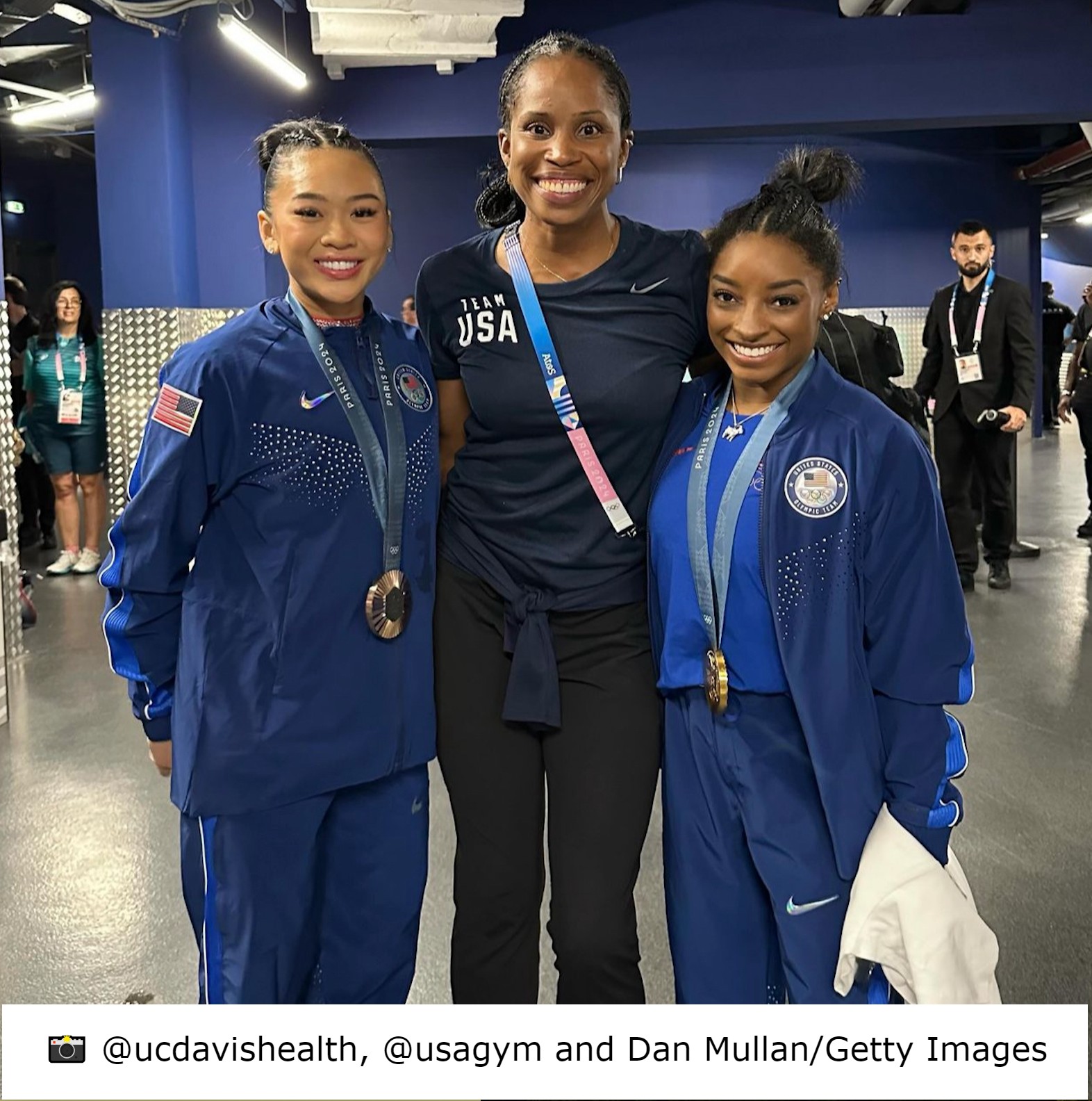 Faustin with Simone Biles and Suni Lee